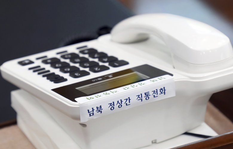 This photo provided by South Korea Presidential Blue House via Yonhap News Agency, shows a telephone hotline between South Korea and North Korea at the presidential Blue House in Seoul, South Korea, Friday, April 20, 2018. North and South Korea installed a telephone hotline between their leaders Friday as they prepare for a rare summit next week aimed at resolving the nuclear standoff with Pyongyang. The Koreans read ” Direct hotline between South and North.”(South Korea Presidential Blue House/Yonhap via AP) SEL801 SEL801