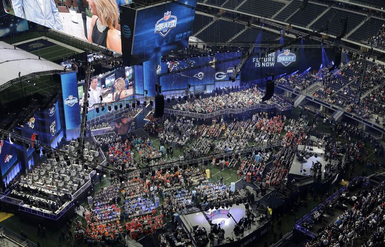 A general, overall view of the inside of AT&T Stadium is shown during the first round of the NFL football draft, Thursday, April 26, 2018, in Arlington, Texas. (AP Photo/David J. Phillip)