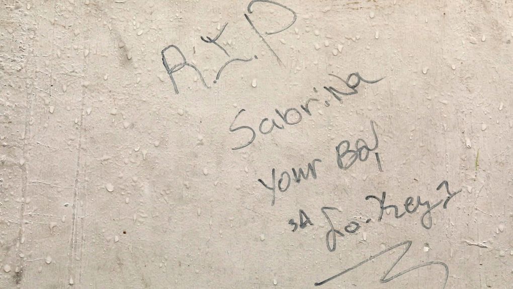 “R.I.P.” reads a message scrawled on the door of Sabrina Tate’s recreational vehicle, parked in the City of Seattle’s last sanctioned lot for vehicle dwellers. (Bettina Hansen/The Seattle Times)