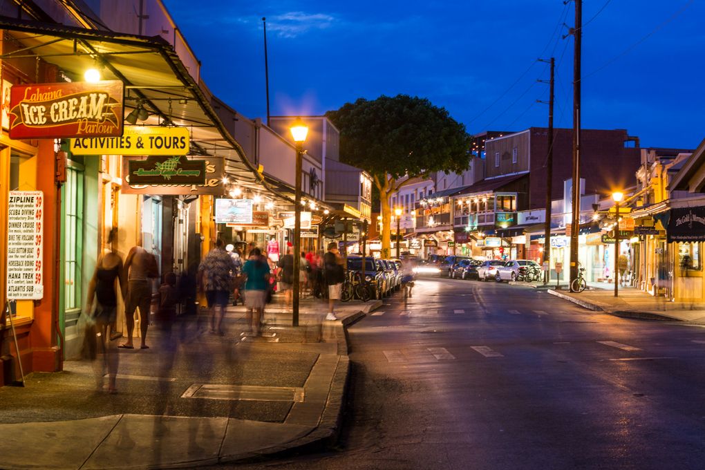 In downtown Lahaina on Maui, Front Street comes alive at night with shoppers and diners in almost any kind of weather. (Hawaii Tourism Authority / Tor Johnson)