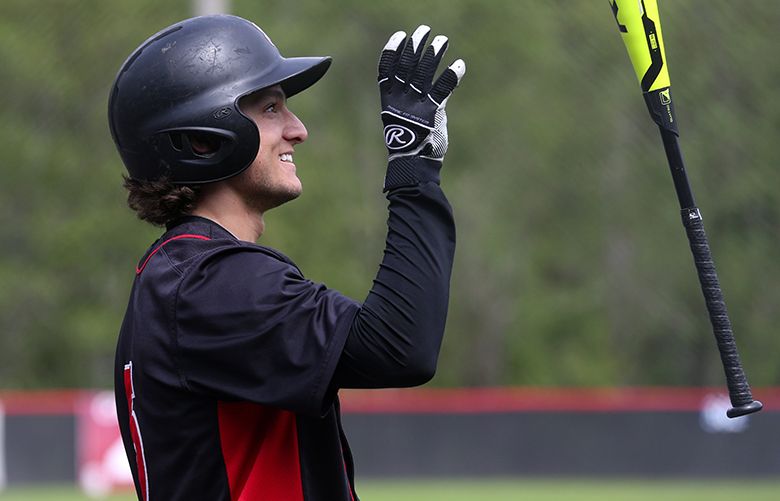 Seattle University center fielder Dalton Hurd, on deck, flips his bat while waiting for a mound visit to conclude for the opposing team during a game against Cal State Bakersfield Sunday, April 29, 2018, in Bellevue.