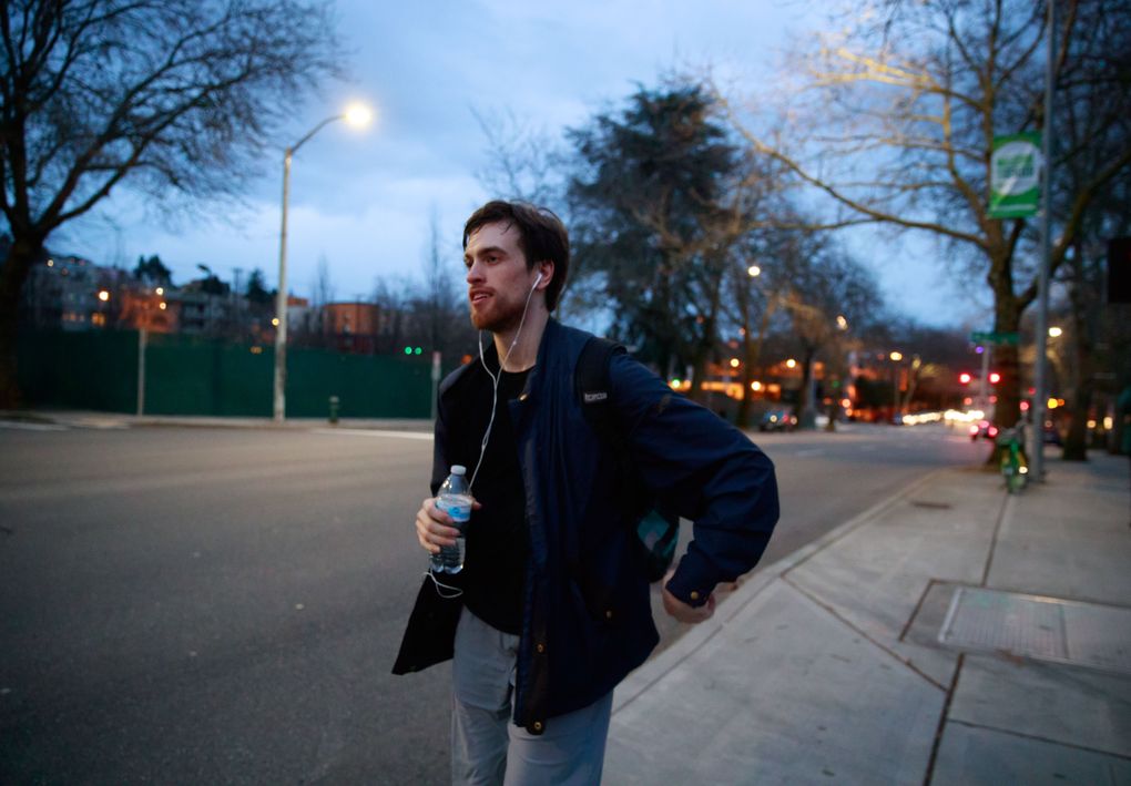 Steven Loch walks home from Pacific Northwest Ballet headquarters on a recent evening. “I think the one thing that I would describe myself as is joyful.” he says. “I’m pretty optimistic. I love to be goofy and fun.” (Erika Schultz / The Seattle Times)