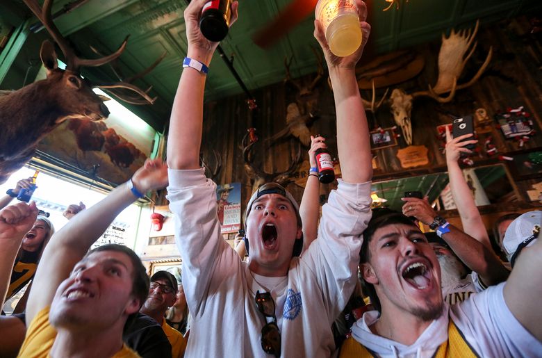 Wyoming fans pack Laramie bar to cheer for QB Josh Allen