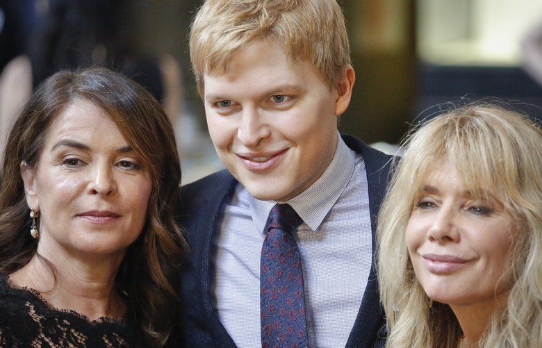 Pulitzer Prize winner for public service Ronan Farrow, center, Annabella Sciorra, left, and Rosanna Arquette, right, arrive for the 2018 Pulitzer Prize winners awards luncheon at Columbia University, Wednesday May 30, 2018, in New York. (AP Photo/Bebeto Matthews) NYBM102 NYBM102