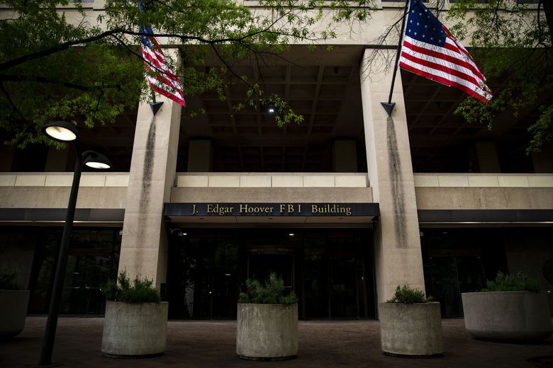 The headquarters of the Federal Bureau of Investigation in Washington, D.C. Days after the FBI closed its investigation into Hillary Clinton in 2016, agents began scrutinizing the campaign of her Republican rival, Donald Trump, who has described the investigation as a politically motivated effort to undermine his presidency. But time and again, agents took steps that ultimately benefited him. (Al Drago / The New York Times, file) 