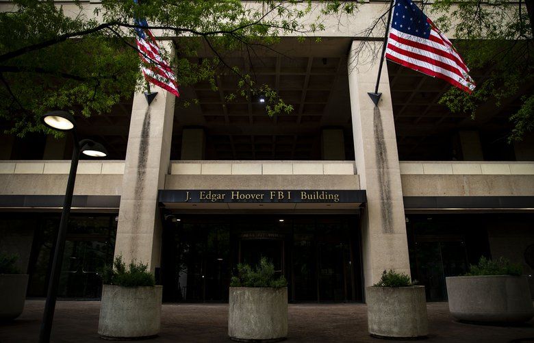 The headquarters of the Federal Bureau of Investigation, in Washington, May 10, 2018. Days after the FBI closed its investigation into Hillary Clinton in 2016, agents began scrutinizing the presidential campaign of her Republican rival, Donald Trump. Trump has described the investigation as a politically motivated effort to undermine his presidency. But time and again, agents took steps that ultimately benefited him. (Al Drago/The New York Times) XNYT67 XNYT67