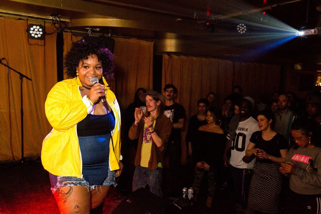 JusMoni sings at Barboza on Capitol Hill in Seattle. The 25-year-old works at The Station coffee shop on Beacon Hill by day, and by night performs at venues around the city. (Courtney Pedroza / The Seattle Times)