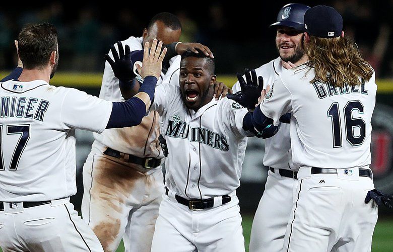 Photos: Mariners over Rangers 9-8 in the 11th | The Seattle Times