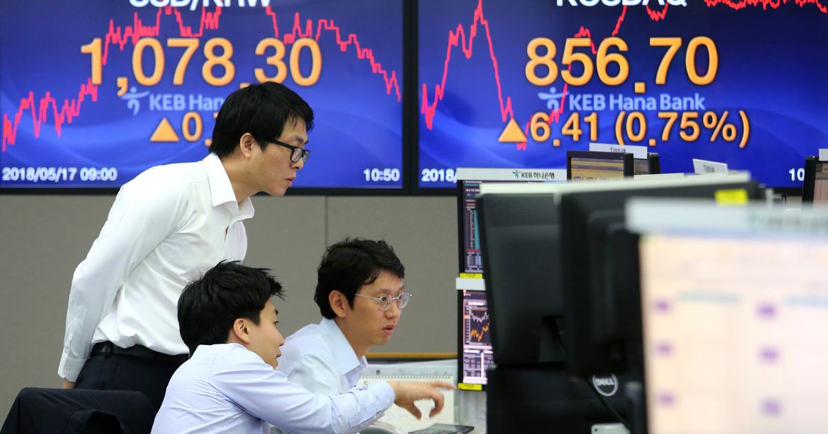 Asian stocks mixed as investors digest US, Japan data | The Seattle Times