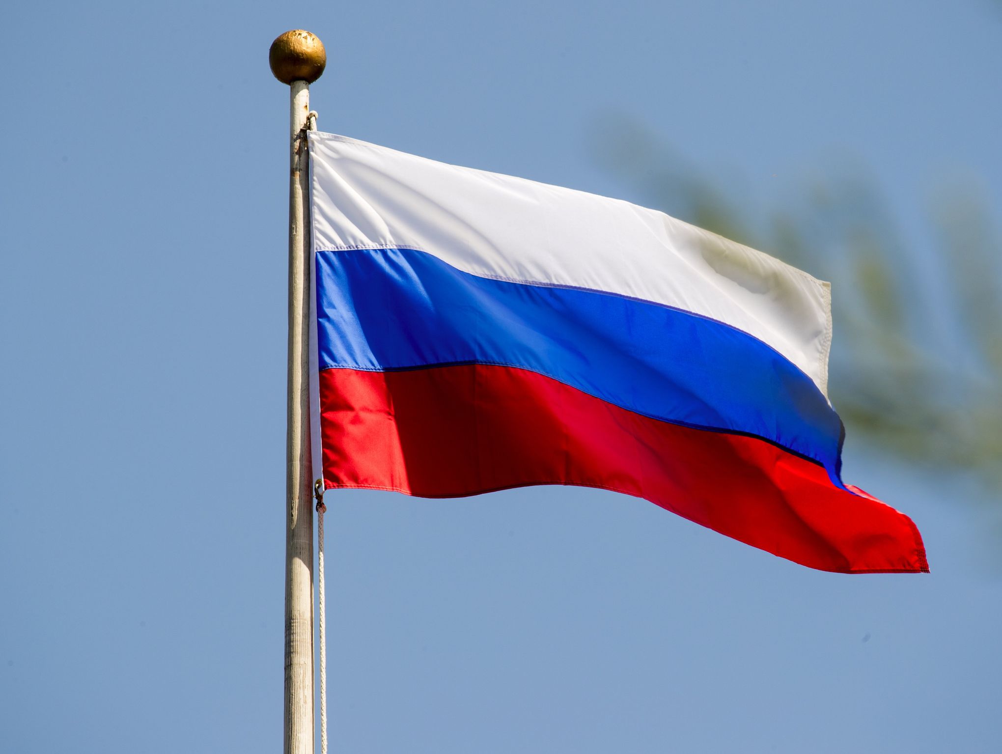 U.S. takes down mansion's flag, raises Russian dander