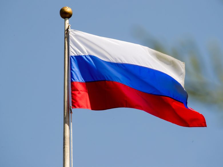 U.S. takes down mansion's flag, raises Russian dander