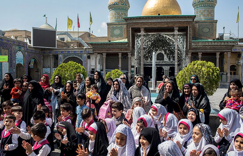 Students on a school trip at the shrine to Shah Abdol Azim, where kings and noblemen have been laid to rest, in Tehran, Iran, April 30, 2018. Whether or not the mummified remains discovered at the shrine were those of Reza Shah Pahlavi, the founder of the dynasty that ended in 1979, they drew yearnings for a strong leader. (Arash Khamooshi/The New York Times)