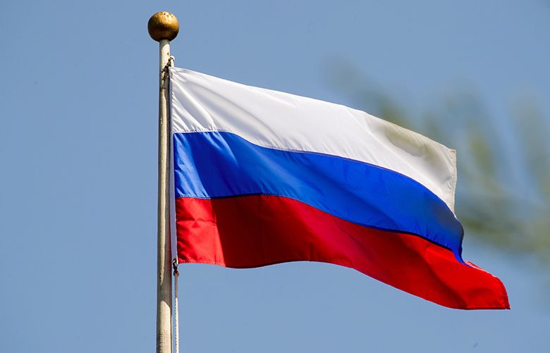 U.S. takes down mansion's flag, raises Russian dander