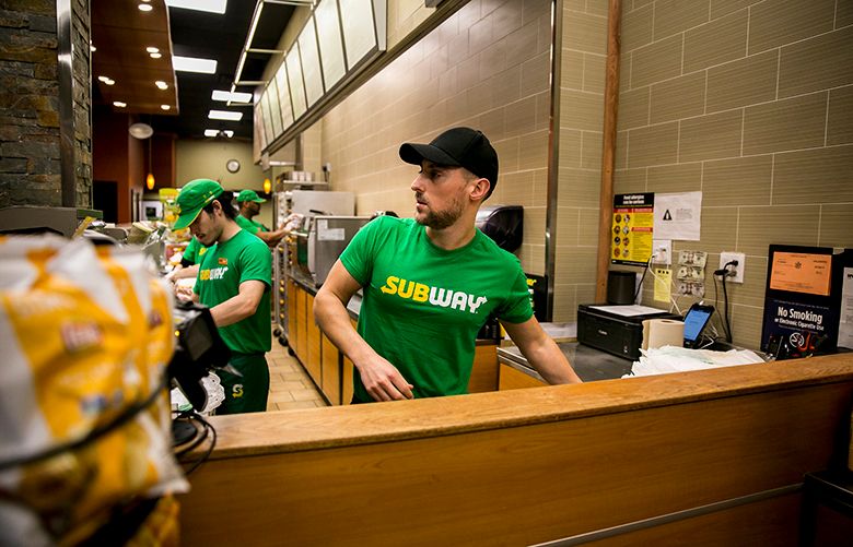 Jeffrey Kaplow works behind the counter at his Subway store in New York, April 3, 2018. Kaplow has tried everything he can think of to find workers, placing Craigslist ads, asking other franchisees for referrals, seeking to hire people from Subways that have closed. (Sam Hodgson/The New York Times)