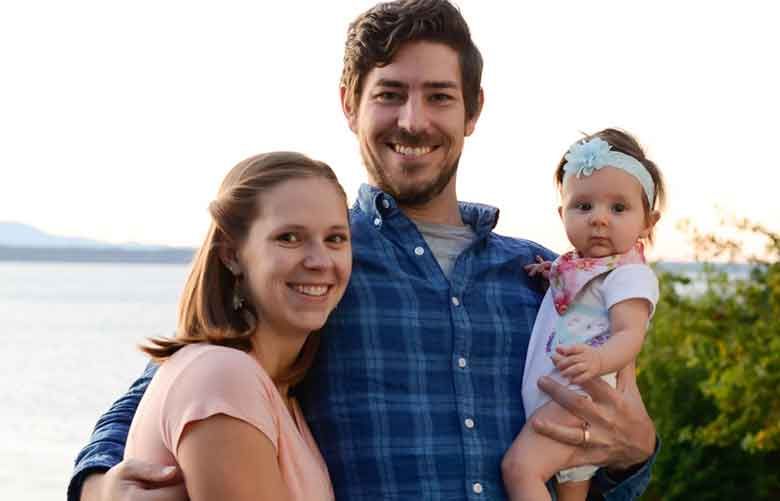 Ted Kimble, 33, of Seattle, with his wife, Olivia, and his daughter, Arabelle. Ted Kimble was the first employee to take advantage of a new paid paternity-leave policy at his company, tech startup Outreach. (Courtesy of Ted Kimble)