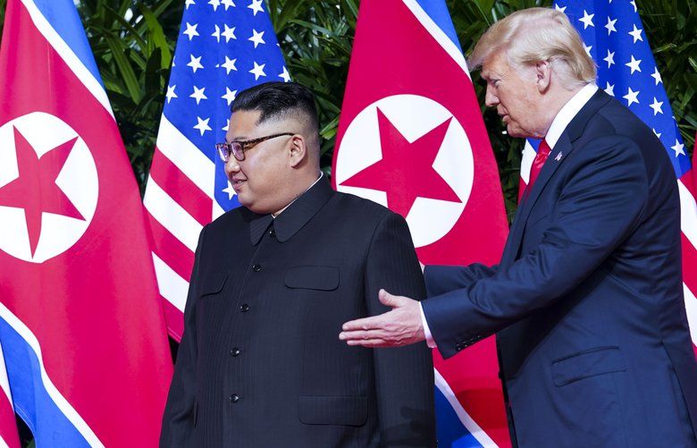 FILE — President Donald Trump and Kim Jong Un, the North Korean leader, meet in Singapore, Tuesday June 12, 2018. North Korea is expected to hand over remains of what is believed to belong to some 200 to 250 American servicemen, more than six decades after the war?s end. (Doug Mills/The New York Times) XNYT10 XNYT10