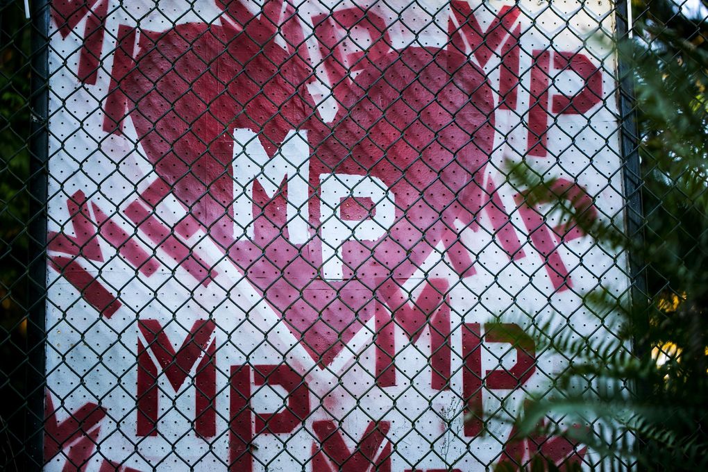 A memorial sign for the Marysville-Pilchuck High School shooting is seen on the Tulalip Reservation at dusk nearly one year after. (Bettina Hansen / The Seattle Times file, 2015)