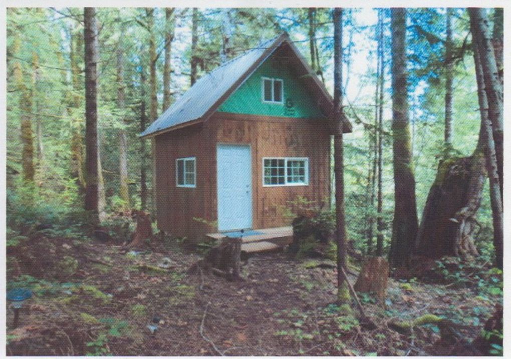 Neighbor Dave Gardner identified this cabin as the one that exploded Sunday on Salmon Street in Brinnon, Jefferson County. Gardner said the family who owned it added a covered porch and a deck since the photo was taken. (Jefferson County Assessor)