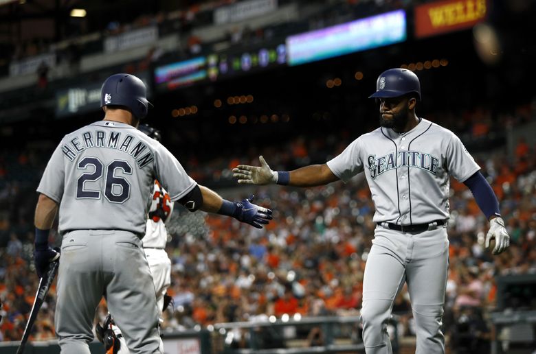 Baltimore Orioles, MANNY MACHADO high fives CHRIS DAVIS after Davis hits a  three-run home run