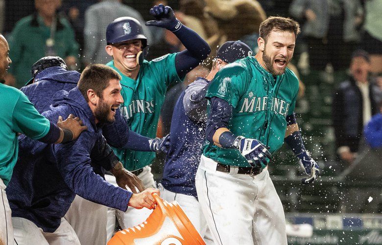 Mitch Haniger hits two HRs and Mariners win on another wild pitch