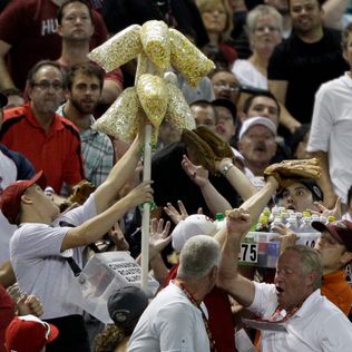 A's beer vendor nearly catches foul in bucket