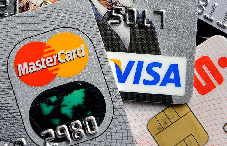 Credit and bank cards (AP Photo/Martin Meissner, File)
