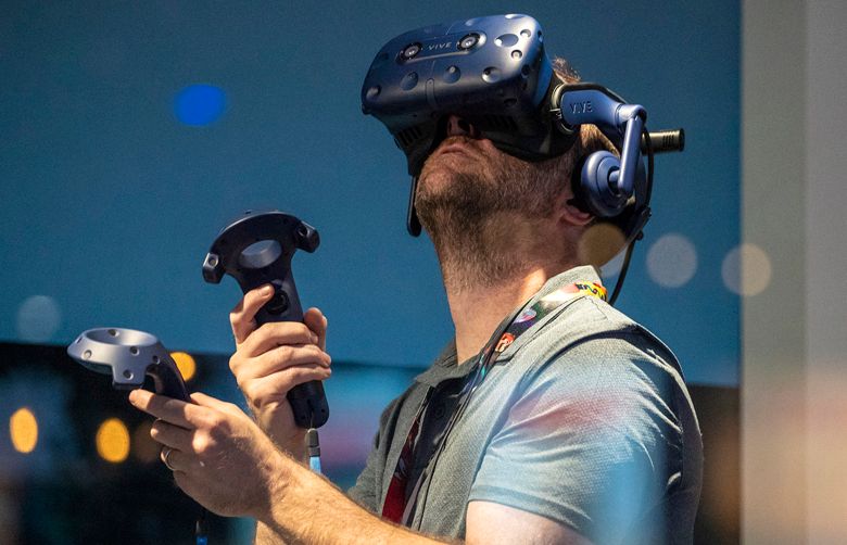 Todd Stoudnor tries his hand on Bethesda VR one the opening day of Gaming show E3 2018 on Tuesday morning June 12, 2018 at Los Angeles Convention Center.(Irfan Khan / Los Angeles Times/TNS)