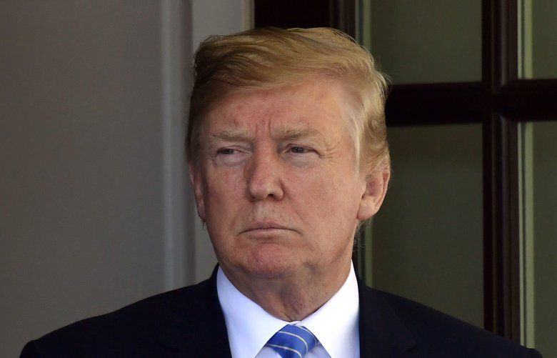 President Donald Trump waits to welcome Dutch Prime Minister Mark Rutte to the West Wing of the White House in Washington, Monday, July 2, 2018. (AP Photo/Susan Walsh) DCSW104 DCSW104