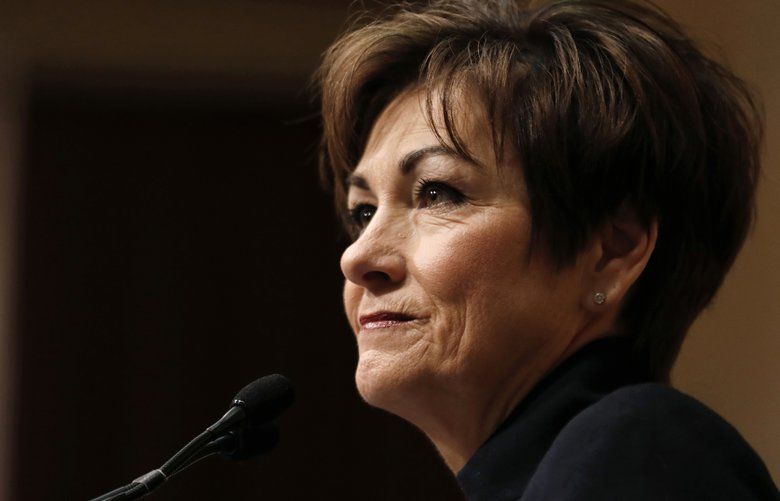 FILE – In this Jan. 9, 2018, file photo, Iowa Gov. Kim Reynolds delivers her Condition of the State address before a joint session of the Iowa Legislature at the Statehouse in Des Moines, Iowa. Democrats and Republicans once largely agreed that the upcoming midterm elections would hinge on the economy, health care and President Donald Trump?s popularity. Not anymore. (AP Photo/Charlie Neibergall, File) WX201 WX201