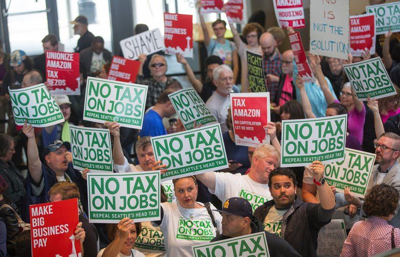 Supporters and opponents of Seattle’s controversial new head tax gather Tuesday at City Hall before the City Council plans to vote in a special meeting to repeal the tax.
Photographed on June 12, 2018. 206637