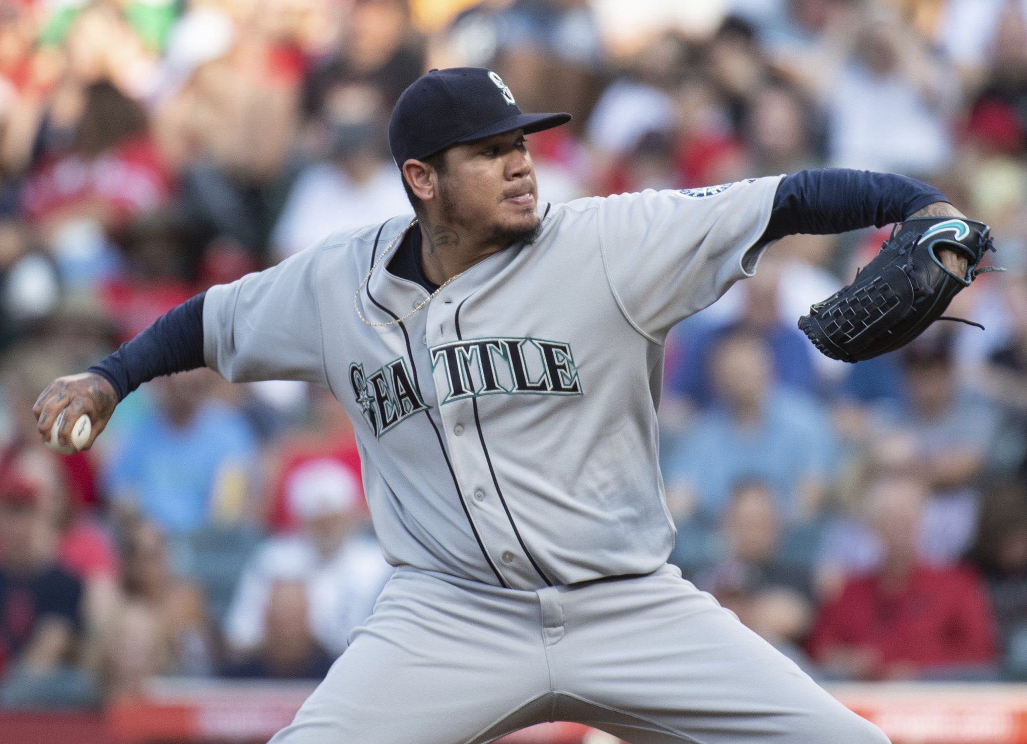 Seattle Mariners starting pitcher Felix Hernandez pulls off his