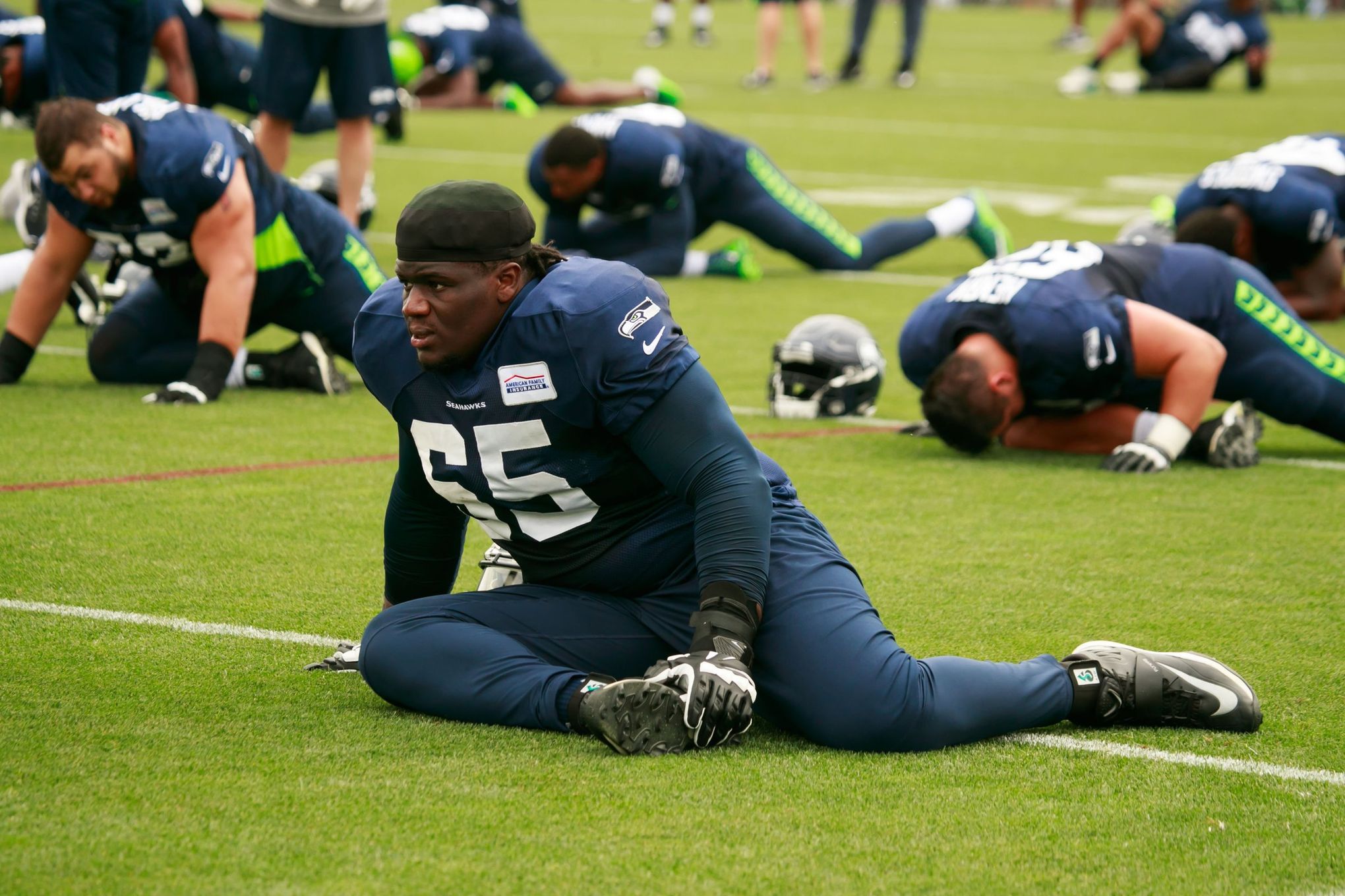 The amazing transformation of Seahawks' George Fant from college power  forward to starting left tackle