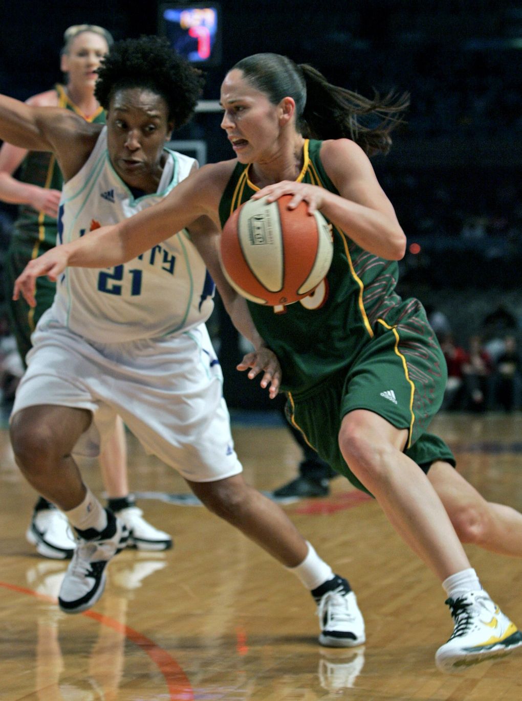 Seattle Storm’s Sue Bird, right, drives past New York Liberty’s Loree Moore (21) during the first half of a WNBA basketball game Tuesday, June 3, 2008 in New York. (AP Photo/Frank Franklin II) NYFF102 (Frank Franklin II / The Associated Press)