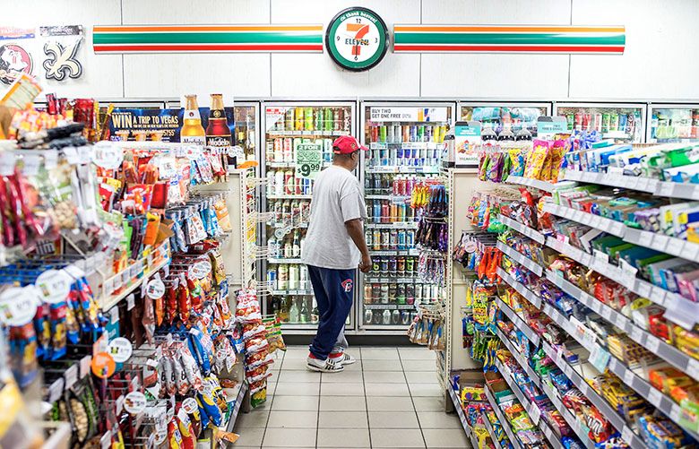 7-Eleven’s private-label juices are displayed alongside name-brand juices at a 7-Eleven convenience store in Orlando, Fla., July 24, 2018. The tensions between 7-Eleven and its franchisees are boiling over as store owners face a new franchise agreement that they say will shrink their profits further. (Zack Wittman/The New York Times)