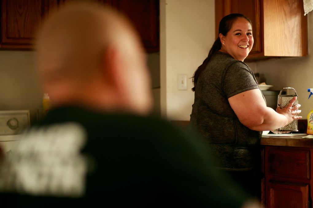 Erika and Juan Lopez make lunch at their home in Hoquiam, where Erika was born and raised. (Erika Schultz/The Seattle Times)