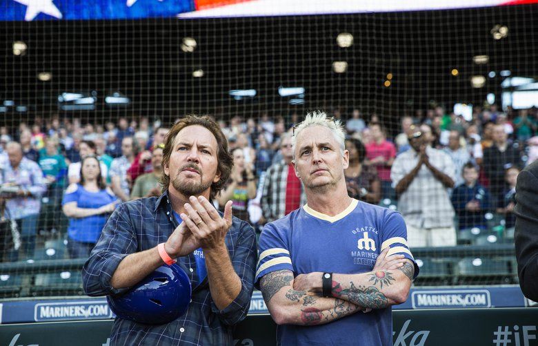 Pearl Jam’s Eddie Vedder, left, and Mike McCready listen to performers from Path with Art perform the National Anthem Friday at Safeco Field.

The Seattle Mariners opened at home following the All-Star break with a game against the Chicago White Sox Friday, July 20, 2018 at Safeco Field in Seattle, WA. 207034