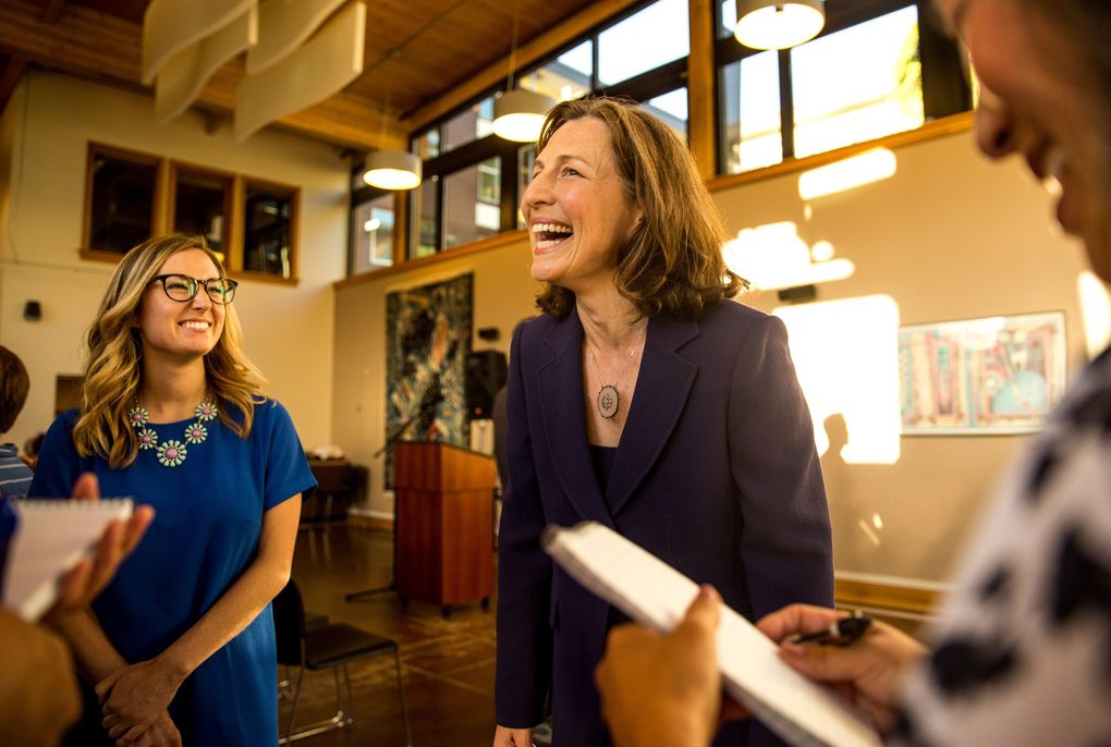 Pediatrician Kim Schrier, who gathered with supporters Tuesday in Issaquah, is in a tight race with Democratic rival Jason Rittereiser to face Republican Dino Rossi in November for the 8th Congressional District seat. (Rebekah Welch / The Seattle Times)