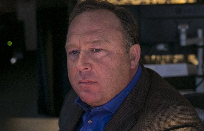 FILE — Alex Jones, conservative conspiracy theorist host of Infowars.com, in his Austin, Texas, control room, Feb. 17, 2017. In 2018, Apple, Facebook, YouTube and Spotify removed from their services large portions of content posted by Jones and his Infowars site, a major step by big technology firms to curb one of the most prominent online voices trafficking in misinformation. (Ilana Panich-Linsman/The New York Times)  XNYT22 XNYT22