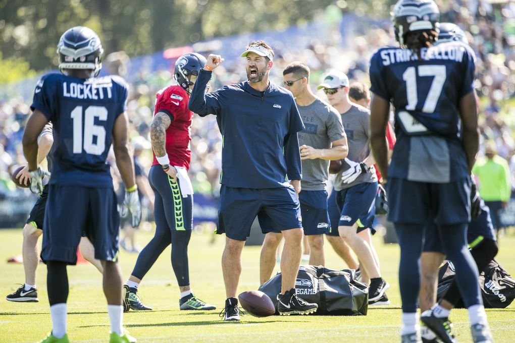 Offensive coordinator Brian Schottenheimer trains players at Seattle Seahawks Training Camp at the Virginia Mason Athletic Center in Renton Tuesday August 7, 2018. (Bettina Hansen / The Seattle Times)