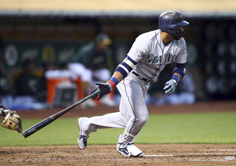 Robinson Cano returns to field for Mariners, after 80-game suspension, to  eventful evening