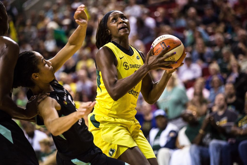 Crystal Langhorne attempts a shot over New York Liberty on Aug. 17. (Rebekah Welch / The Seattle Times)