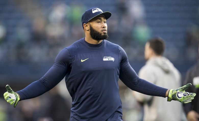 Former Seattle Seahawks NFL football linebacker K.J. Wright takes a penalty  kick after he was fouled while playing in the MLS soccer Seattle Sounders'  media match, Friday, Sept. 2, 2022, in Seattle.