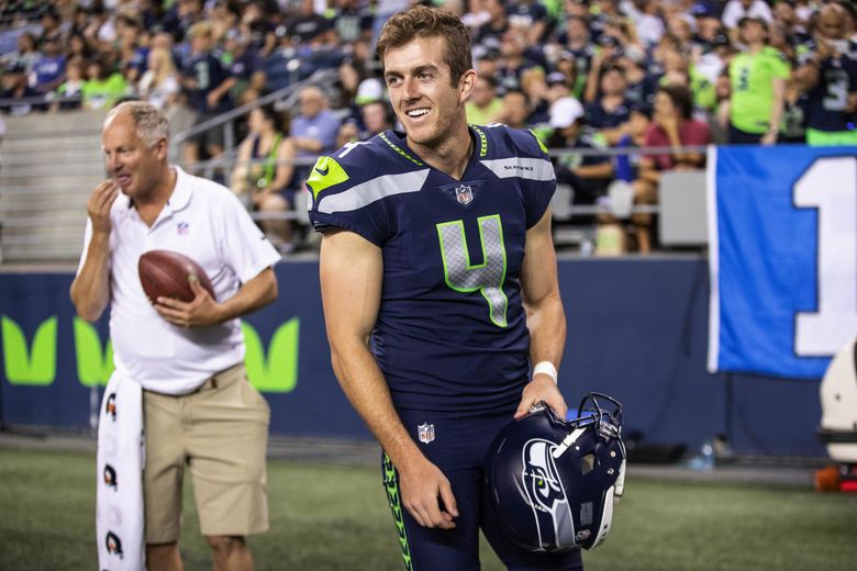 Seattle Seahawks punter Michael Dickson (4) on the sideline before an NFL  football game against the