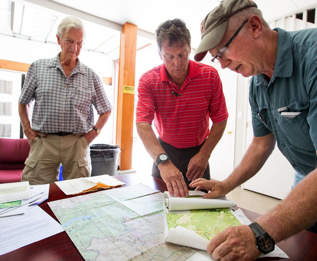 Ken Farquharson, left, was one of the leaders in the 1970s who brought Skagit River conservation efforts to the public’s attention. At center is Shaun Hollingsworth, the Canadian co-chair of the Skagit Environmental Endowment Commission. At right is Joe Foy, co-executive director for the Vancouver-based Wilderness Committee. (Mike Siegel/The Seattle Times)