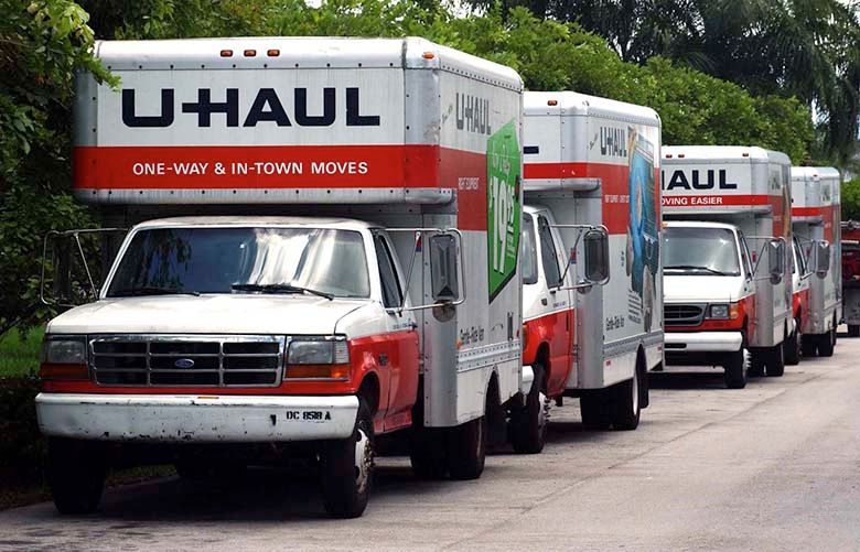U-Haul trucks are parked at a Coral Springs, Florida storage facility on Thursday, Aug. 7, 2003. Amerco Inc., parent of the truck rental company U-Haul, whose stock has doubled since its June bankruptcy on speculation that it would be able to repay its debt, reported in a court filing that it has liabilities almost three times larger than previously disclosed. Photographer: Richard Sheinwald/ Bloomberg News.