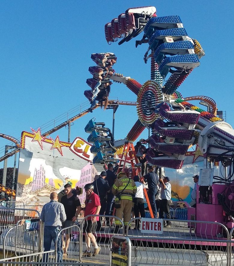 Roller coaster stuck on tracks at Washington State Fair