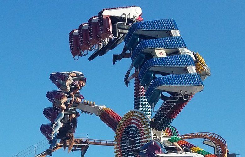 Roller coaster stuck on tracks at Washington State Fair