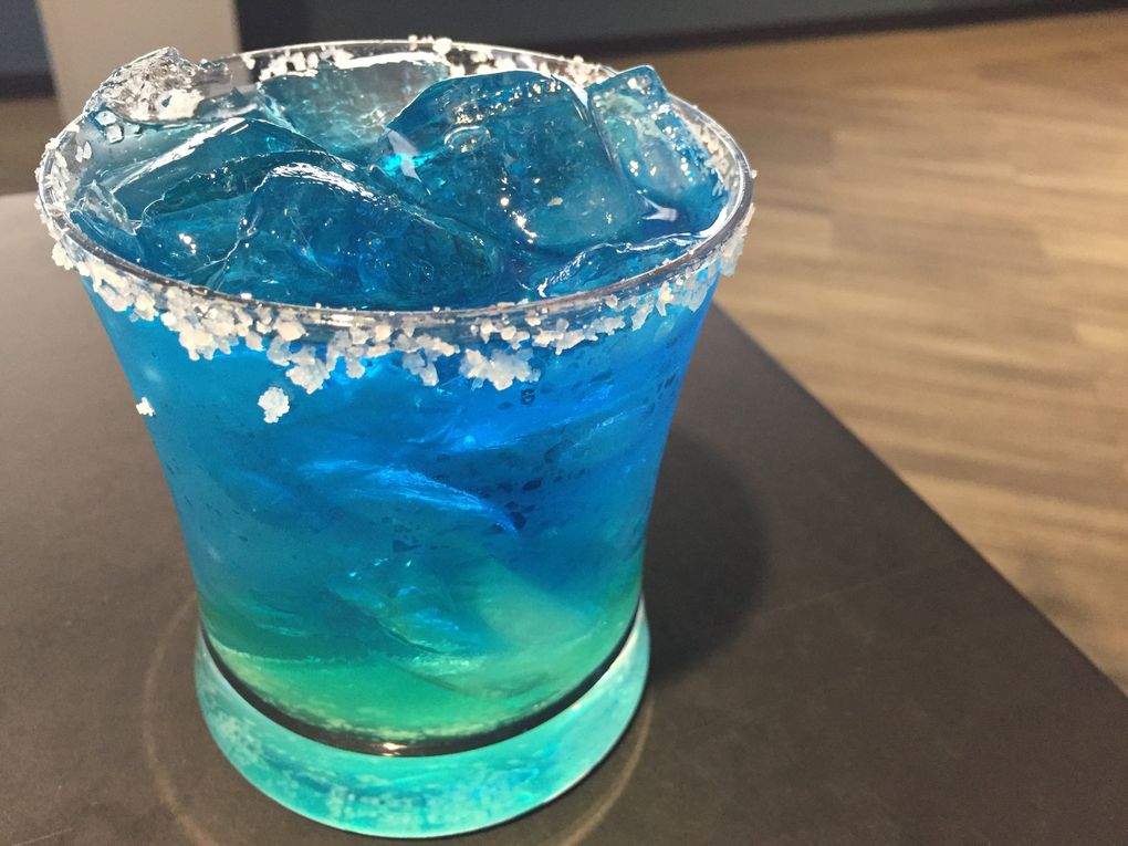 The extremely blue margarita at Sky View Observatory at Columbia Center was the worst cocktail Bethany’s had in years — but for Tan, just the worst one he’s had in 2018 (he’s hit more bars than Bethany). (Bethany Jean Clement / The Seattle Times)