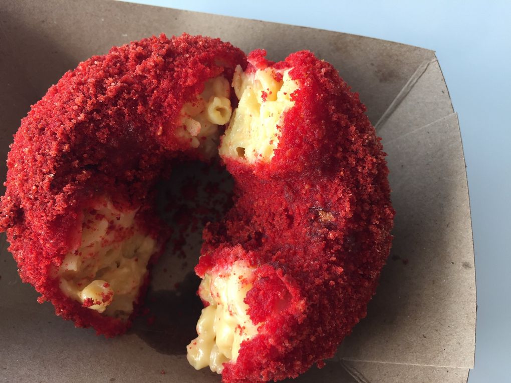 Despite its violent exterior color, the Space Needle’s bizarre mac-and-cheese torus tasted entirely bland and was mushy to boot. (Bethany Jean Clement / The Seattle Times)