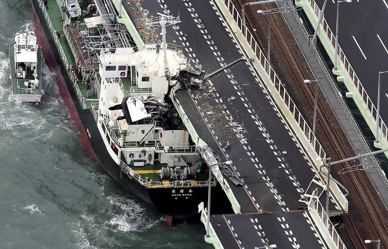 Stormhit Japan airport counts damage; unclear when reopens The